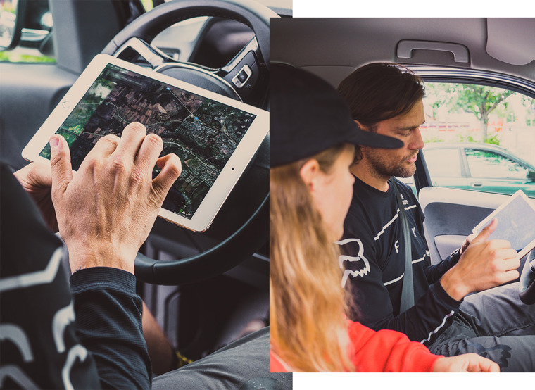 Robert and Hanna are sitting in the car looking at the map on the iPad to determine today's excursion destination.